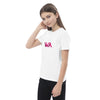 young Girl in white t-shirt featuring a pink  Wear-it-around logo with a geometric pattern.