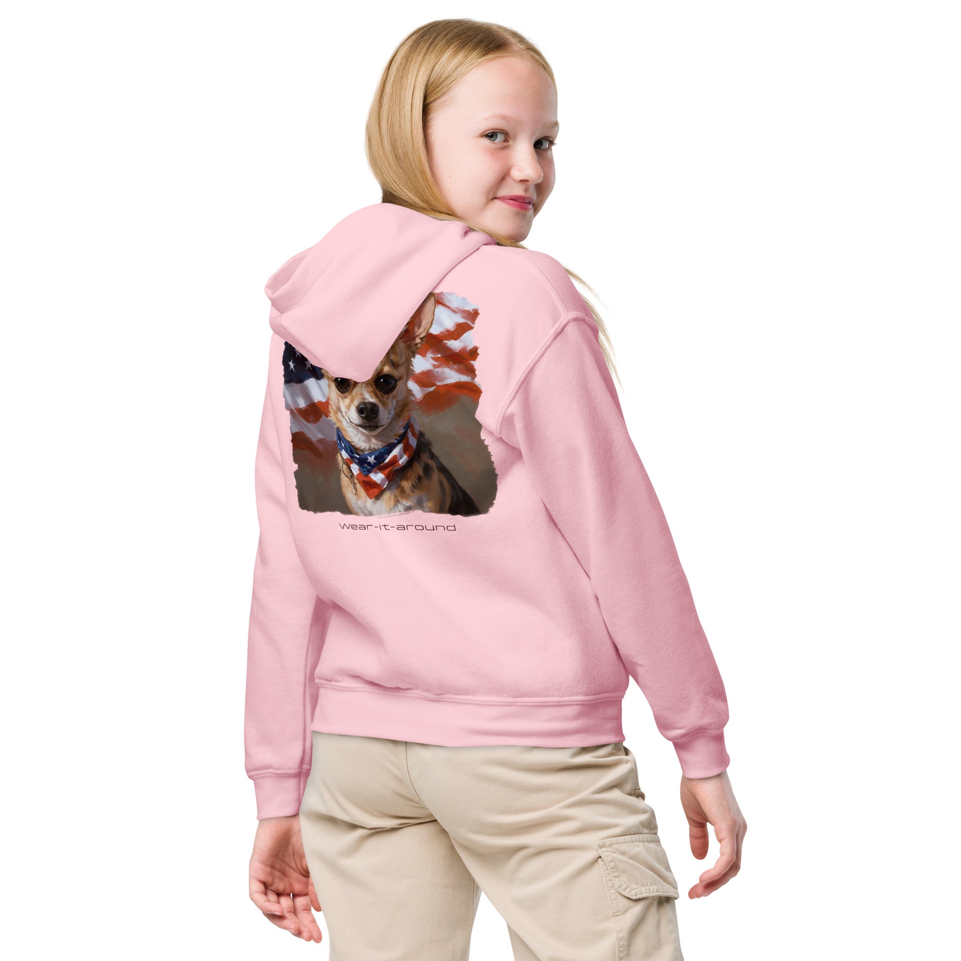 a young girl in a pink hoodie featuring a patriotic Chihuahua design